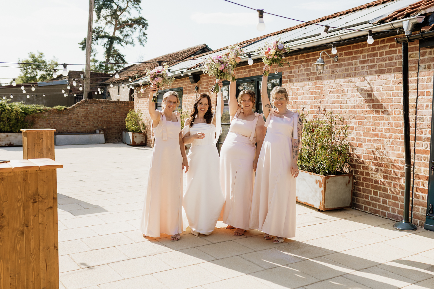 Bridesmaid bouquets and botanical buttonholes for a Battleswick Farm wedding